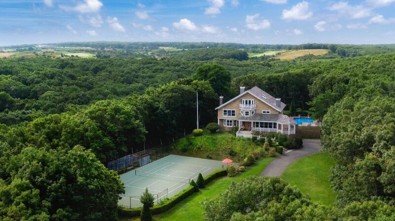Stunning historic manor home with a private tennis court