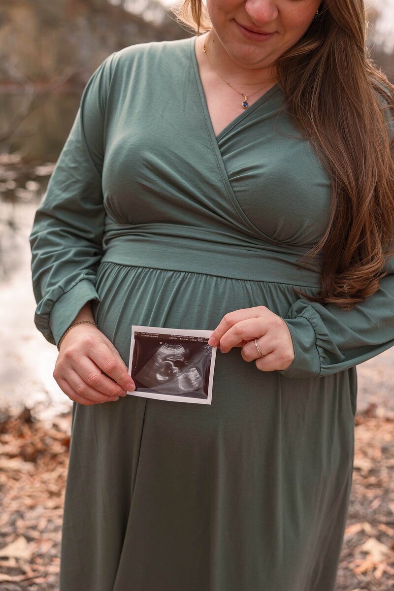 Glowing mother-to-be during a sunset maternity session in Richmond, VA, capturing the beauty of pregnancy