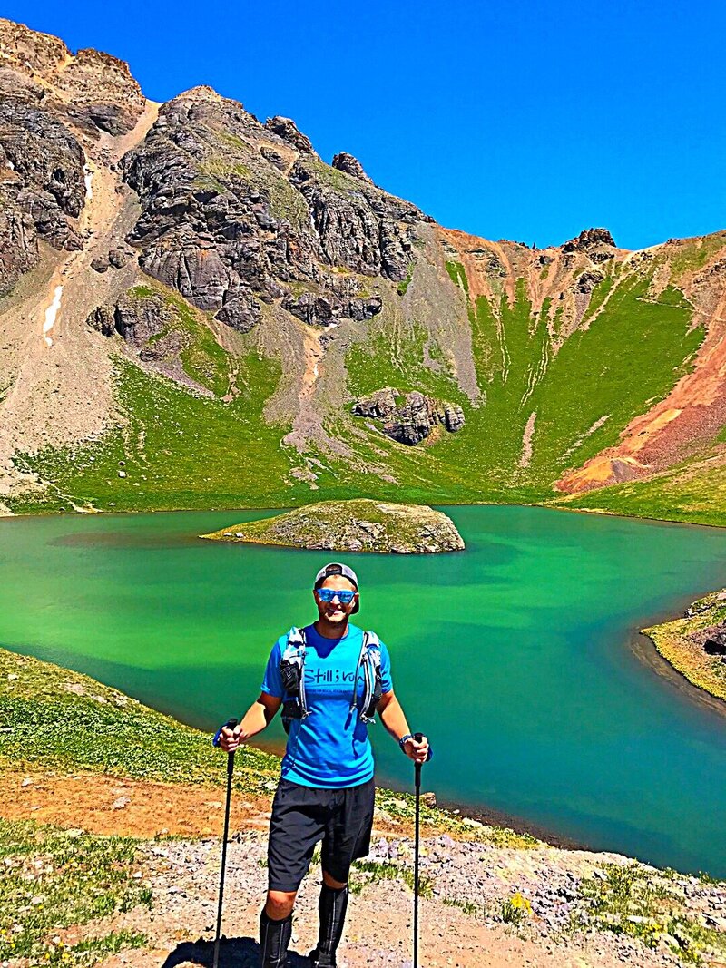 Therapist hiking near lake