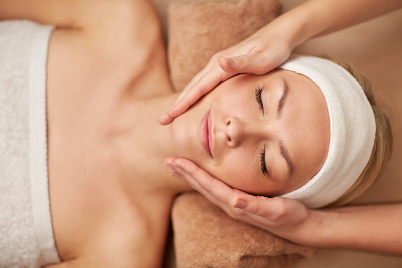Relaxing facial session focused on caregivers, offering renewal and stress relief through soothing touch.