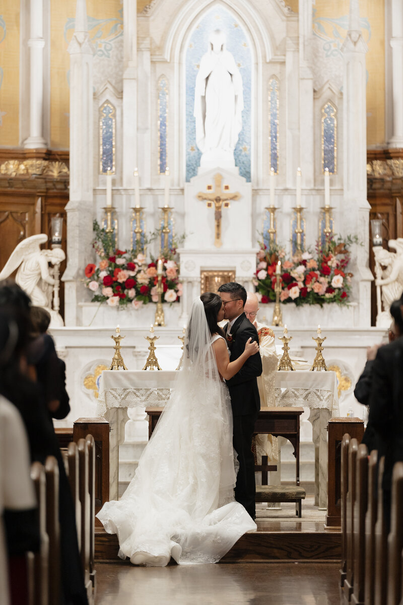 Groomsmen standing in a catholic church