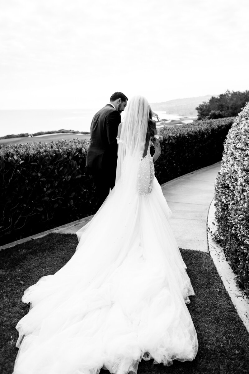 Bride and groom walk up memorial steps at their DC wedding