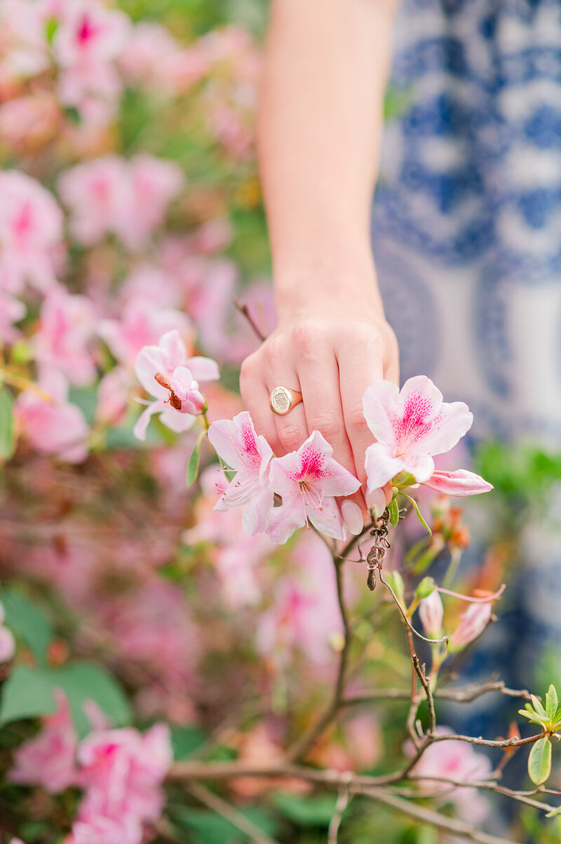 close up of an engagement ring on a woman's hand