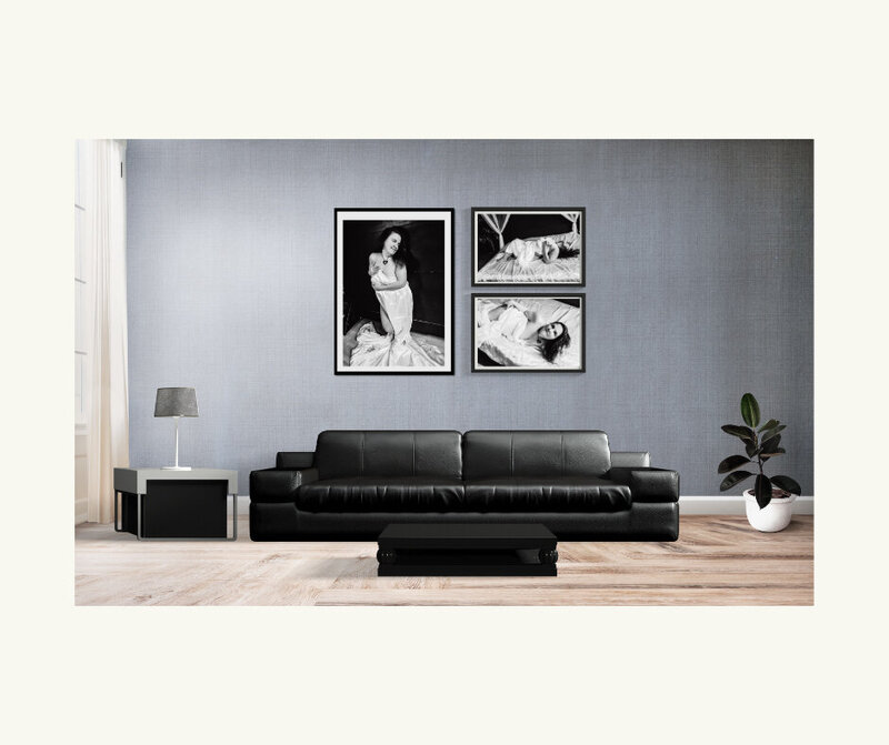 A three peice wall art gallery above a black sofa in Minneapolis Mn