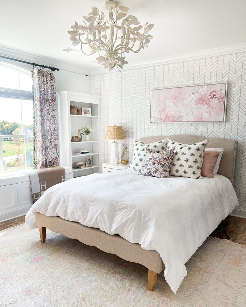 a chic bedroom decorated with neutrals