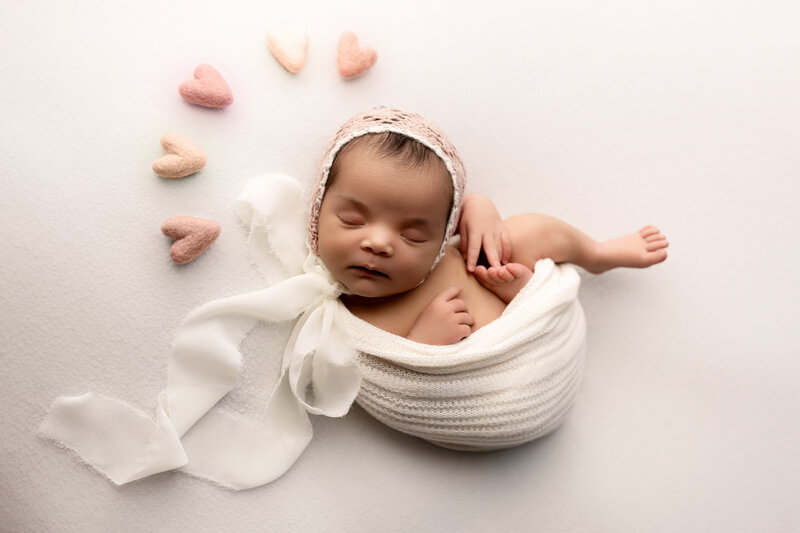 Sacramento, Ca Newborn Photographer. Posed newborn photography. baby girl newborn session