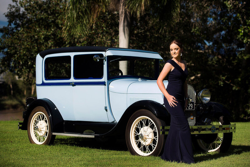 senior girl posing with vintage car in Rockhampton, QLD