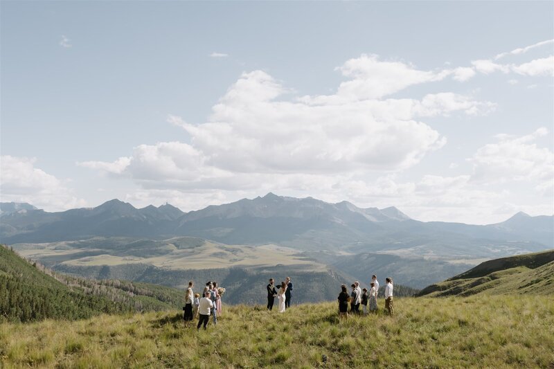 Bride and groom get married on a mountain top in Telluride Colorado