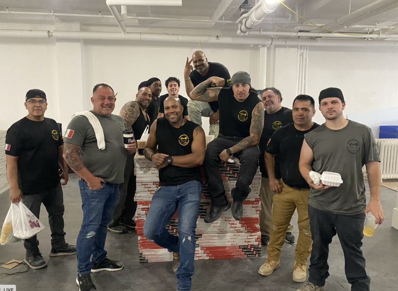 Ambroselli Construction team on site in New York, showcasing their collaborative approach to commercial interior build-outs.
