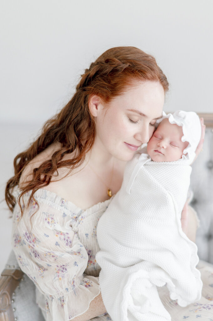 newborn in white swaddle by Nashville portrait photographer Kristie Lloyd