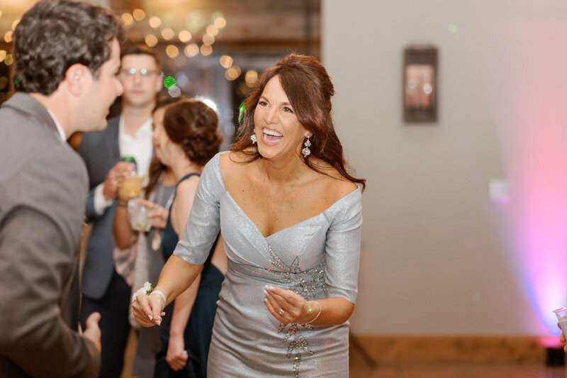 Reception decor in Canyonwood Ridge hall with romantic lighting and Hill Country details