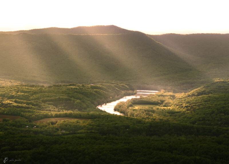 Beams of light over the Shenandoah River
