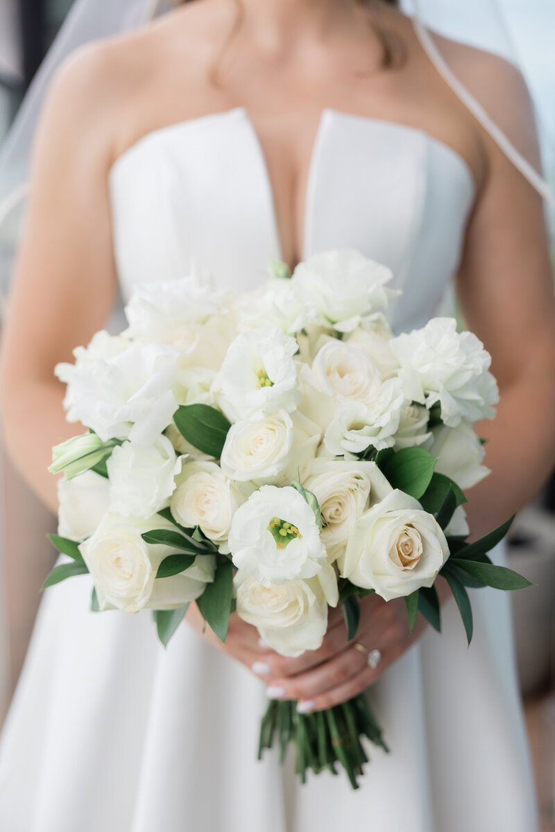 White Wedding Bouquet held by bride at The Ben, Autograph Collection in West Palm Beach
