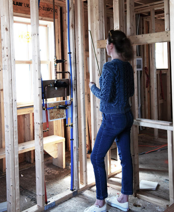 Boston interior designer on-site for a kitchen and bath renovation on the South Shore, bringing timeless design, functionality, and elegance to coastal living.