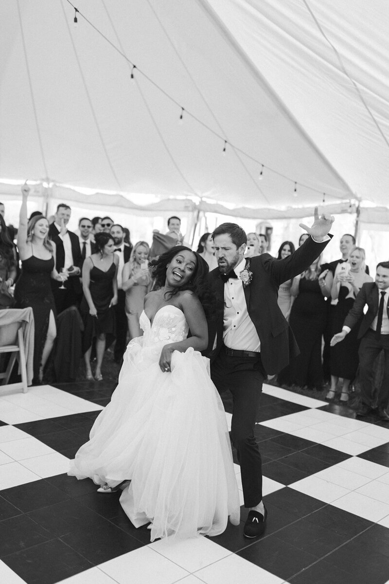 Documentary wedding photography of bride and groom on the dance floor
