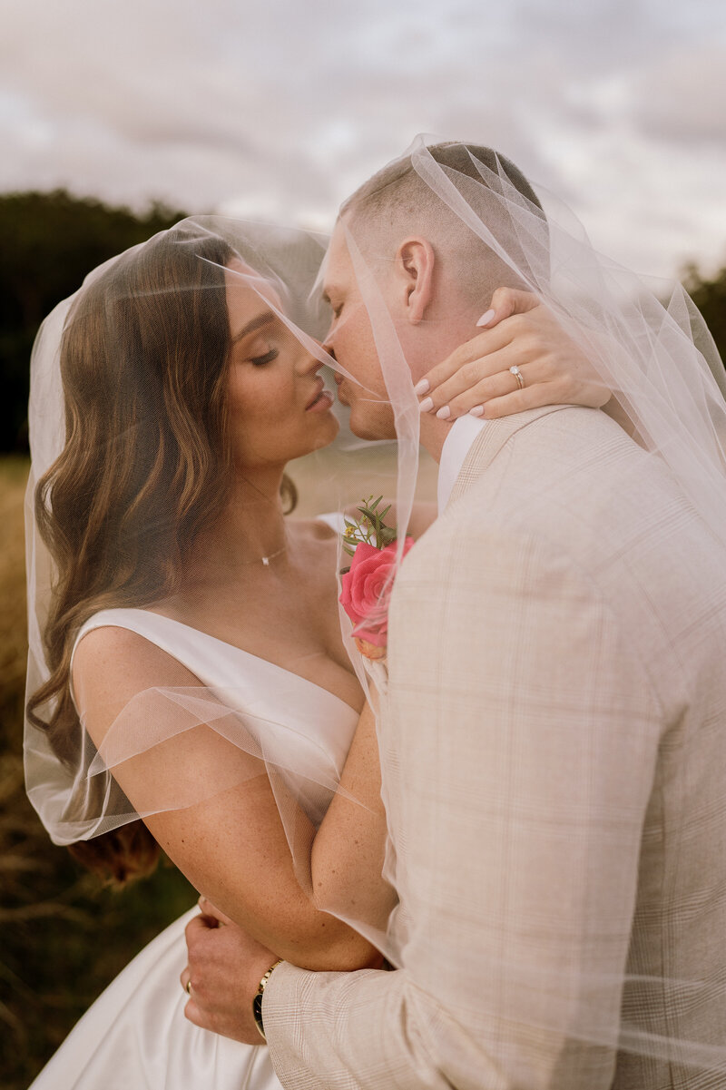 romantic photo of a couple - soft brunette waves and winged liner
