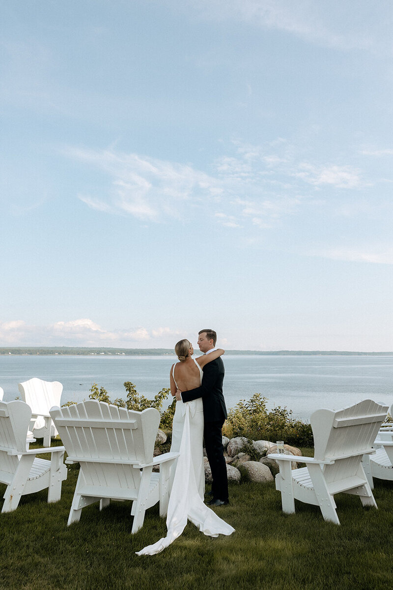 bride-groom-embracing-coastal-view-keli-photography-new-england-weddings-hudson-valley-weddings