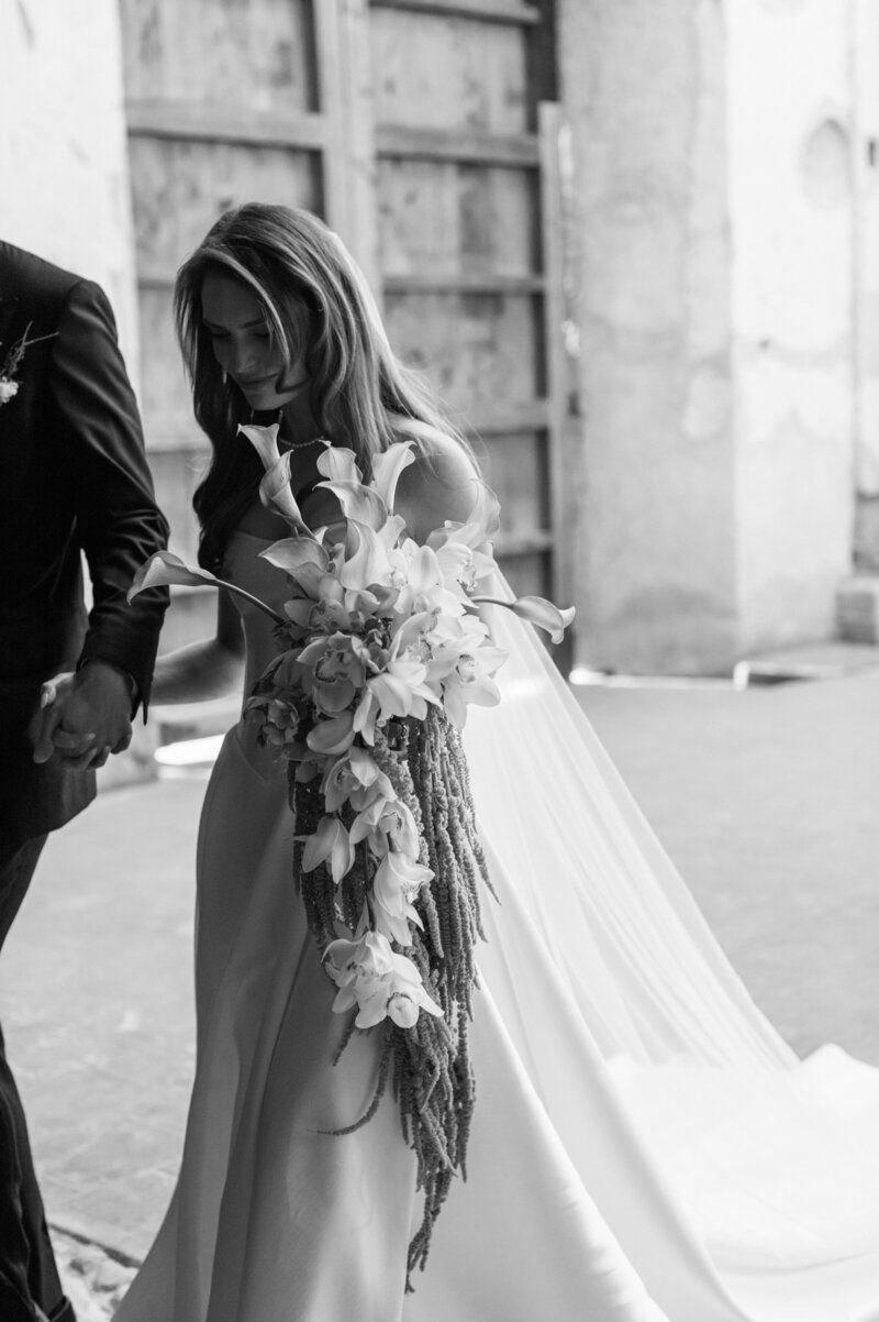 Bride and Groom dancing and enjoying together black and white