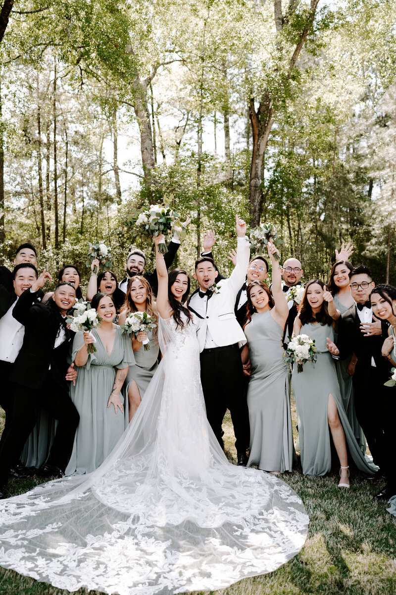 Fun and timeless wedding party portrait photographed by Houston wedding photographers Julie & Daniel