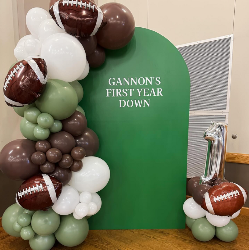 football themed birthday balloons and backdrop