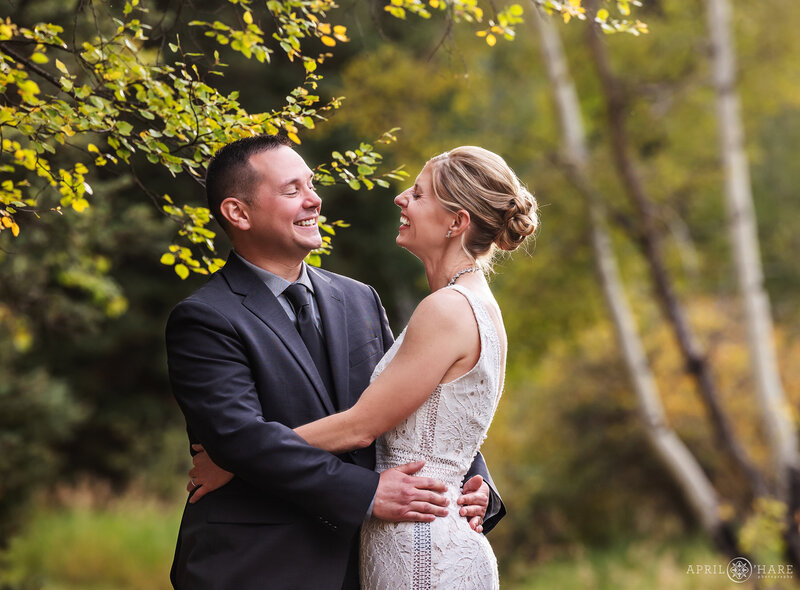 Sweet Wedding Photo of a Couple at their Fall Wedding at Beaver Ranch in Conifer Colorado