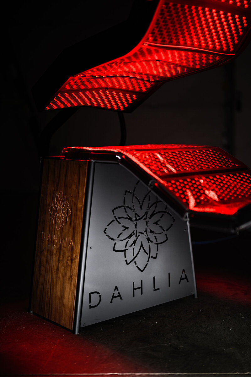 Dahlia Pinnacle red light therapy bed with red LED panel
