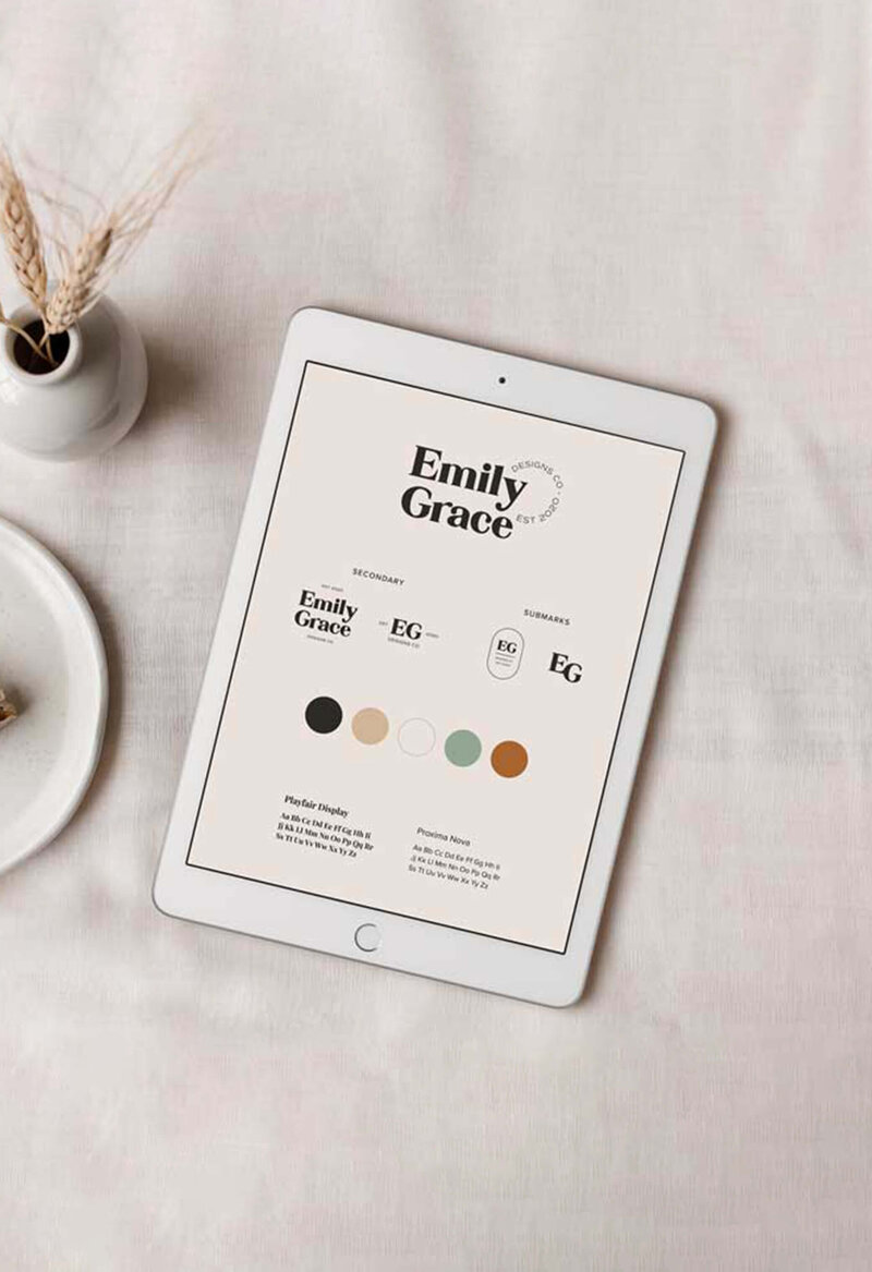 Mockup of brand board for apparel brand on iPad on neutral background