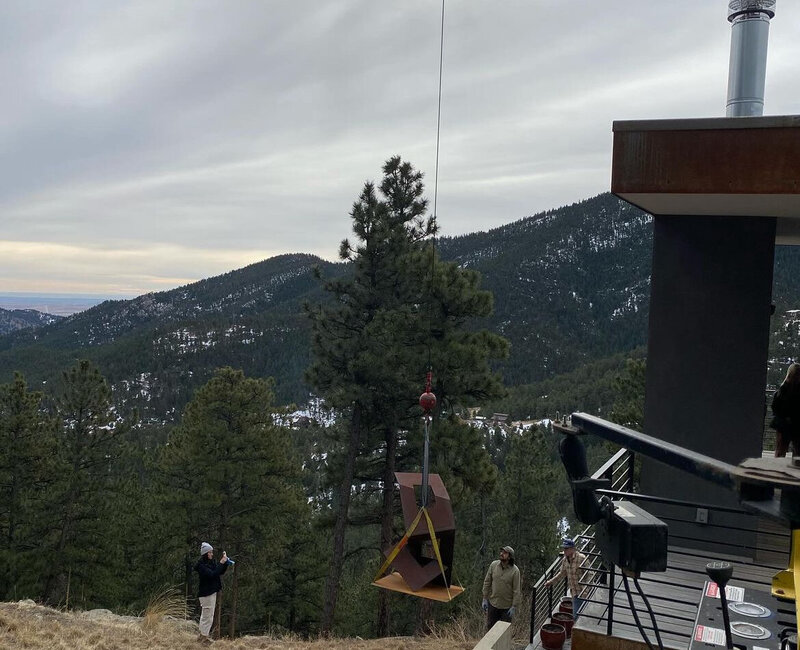 Expert sculpture installation by crane service in Foothills and Mountains