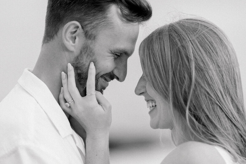 close up of a couple nose to nose smiling