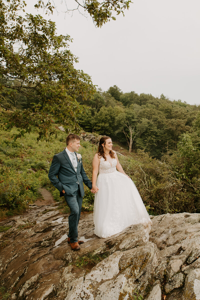 summer elopement in shenandoah national park at spitler knoll overlook at sunset