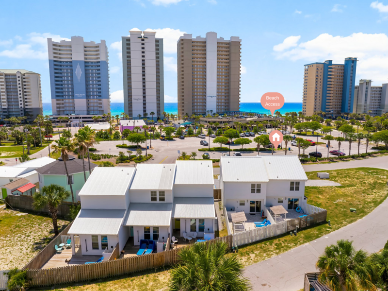 Aerial view of Beach Bum Retreat vacation rental with direct beach access across the street in Panama City Beach, Florida.