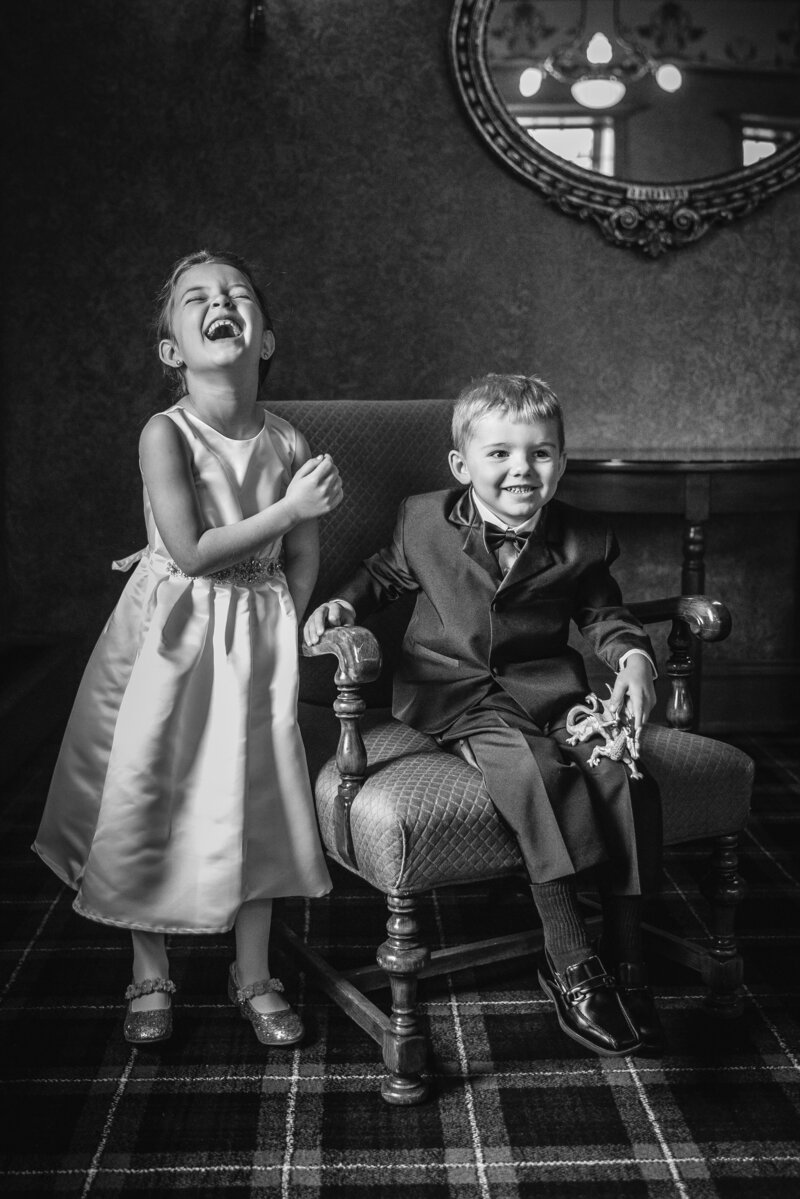 candid photo of children laughing during a wedding in Detroit. 