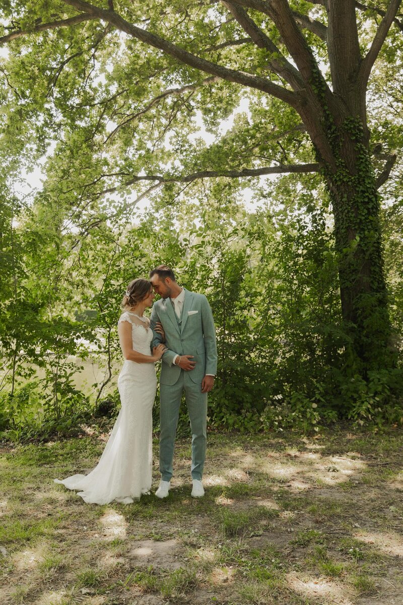 bride-and-groom-holding-hands-forrest-wedding-day