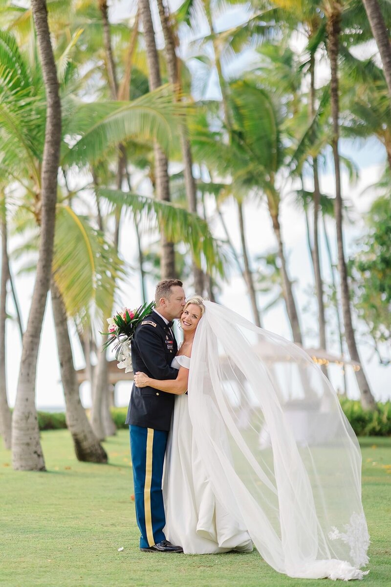 wedding portrait of newlyweds with flying veil