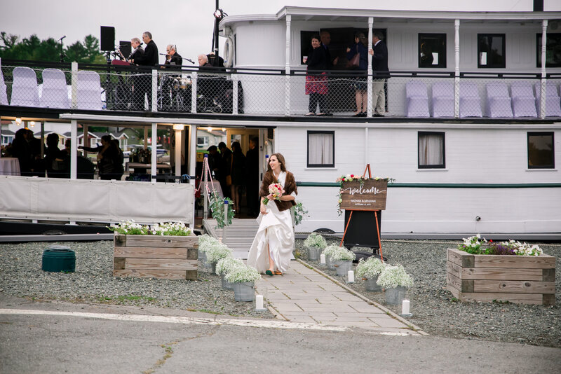 Bride walking off of the boat | Wedding Photography