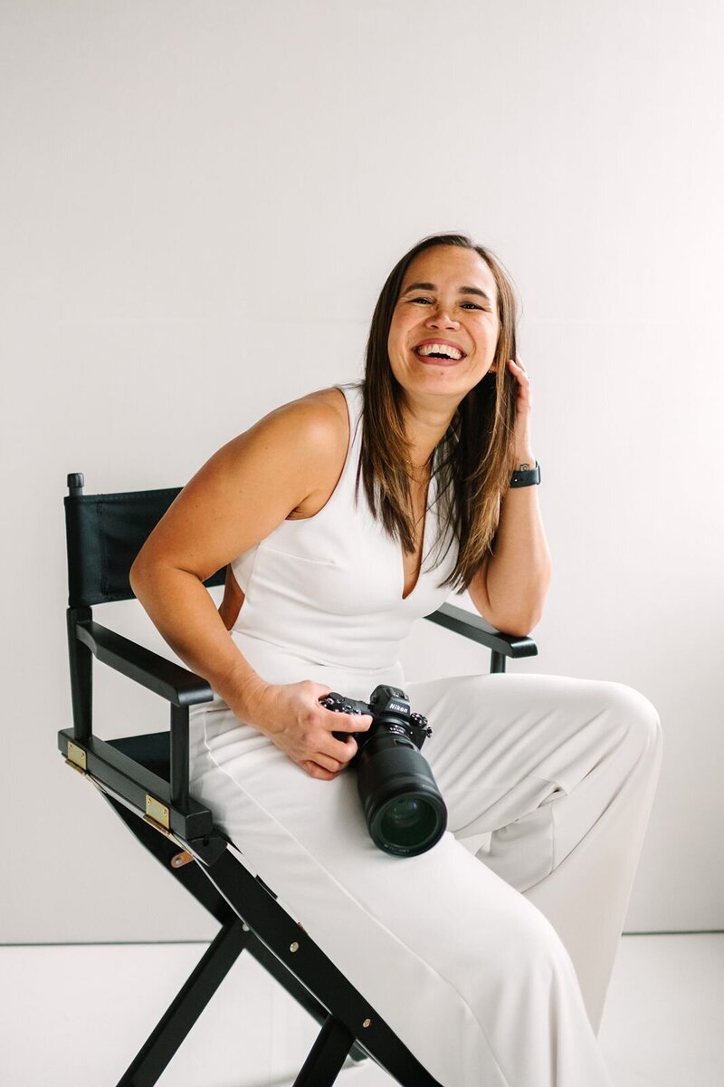Indiana Photographer Mika smiling with her camera