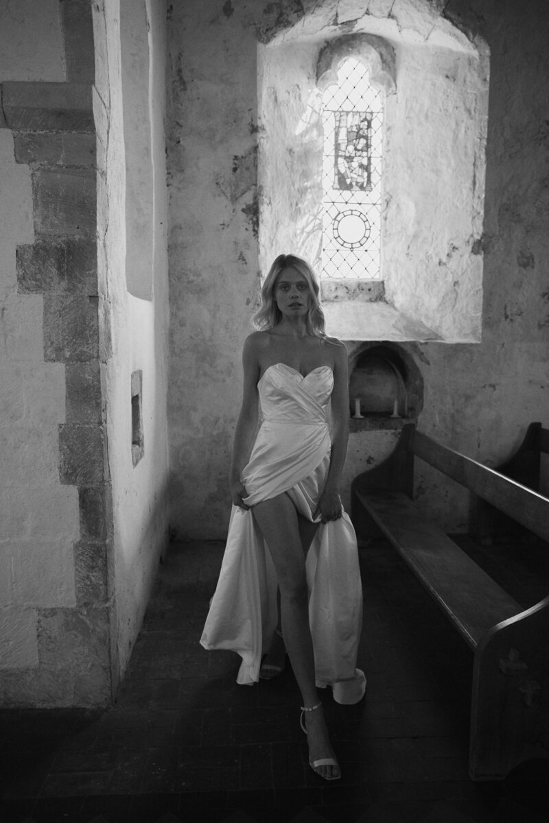 Wrap wedding dress in silk worn by elegant bride by British designer Luna Bea