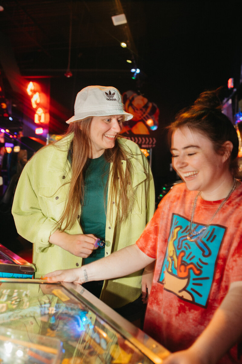 KP and Jessie playing arcade games