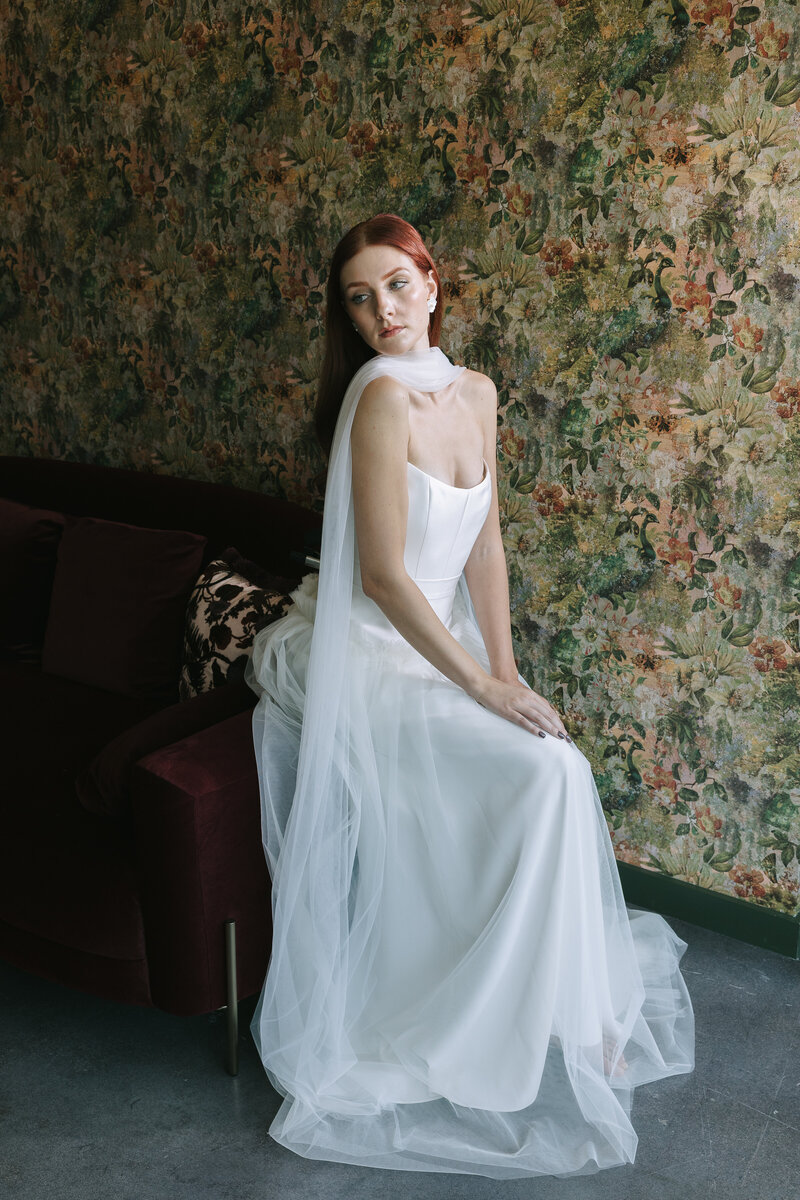 bride wearing white satin slip dress