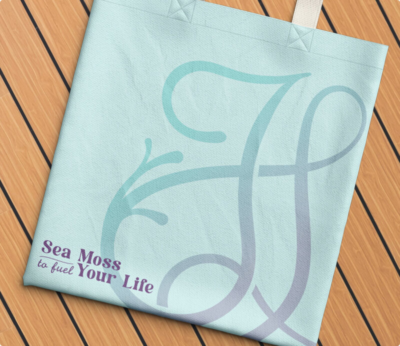 Just Livity tote bag laying on top of a wood strips.