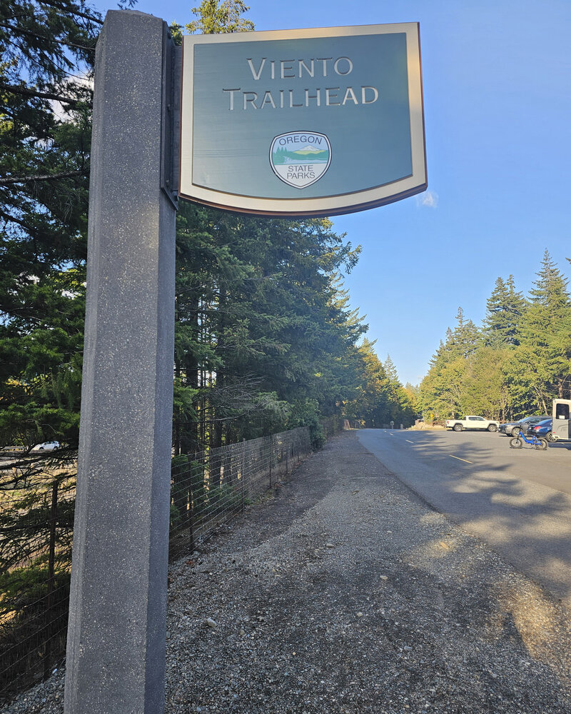 Gather with friends at the Viento Trailhead post sign before setting off on your e-bike adventure with The Gorge E-Bike Adventure Rentals