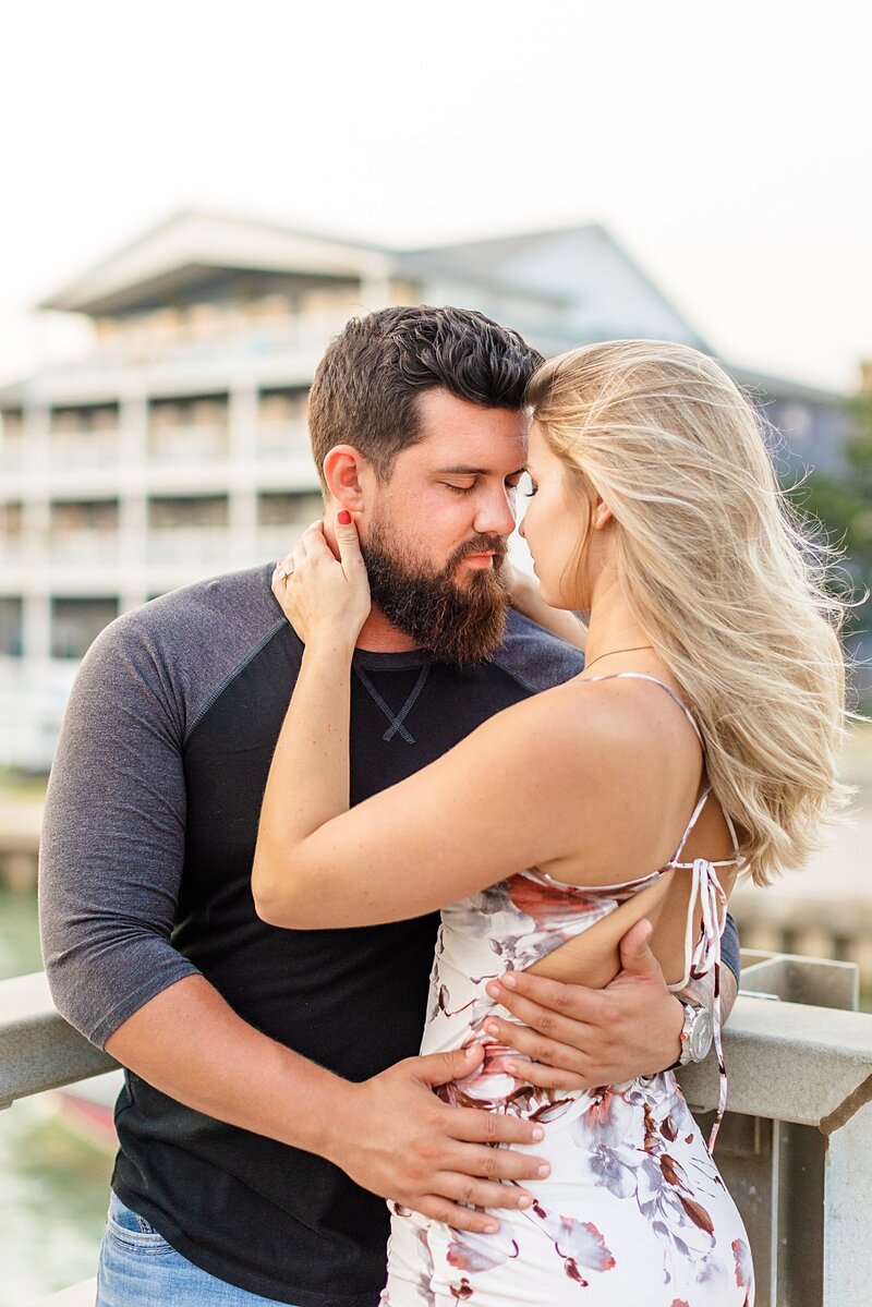 drew-jacobs-and-fiance-hugging-on-bridge