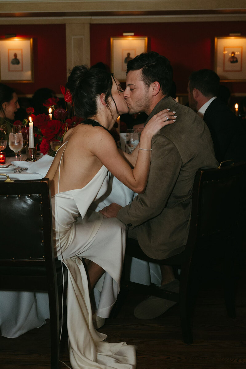 Caribou Club Aspen Wedding – Formal black-tie wedding dinner with moody lighting and candlelit elegance