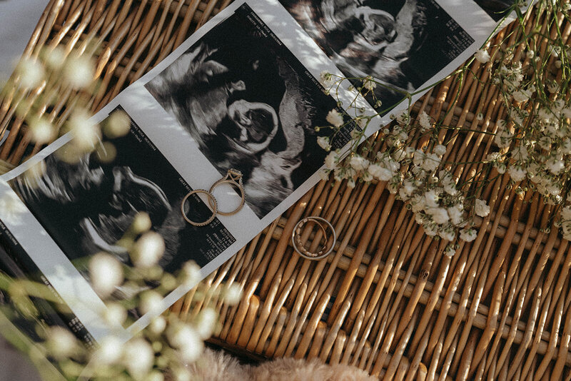 ultrasound photos with flowers captured during maternity photoshoot by Elsie Goodman Photography, an NYC maternity photographer
