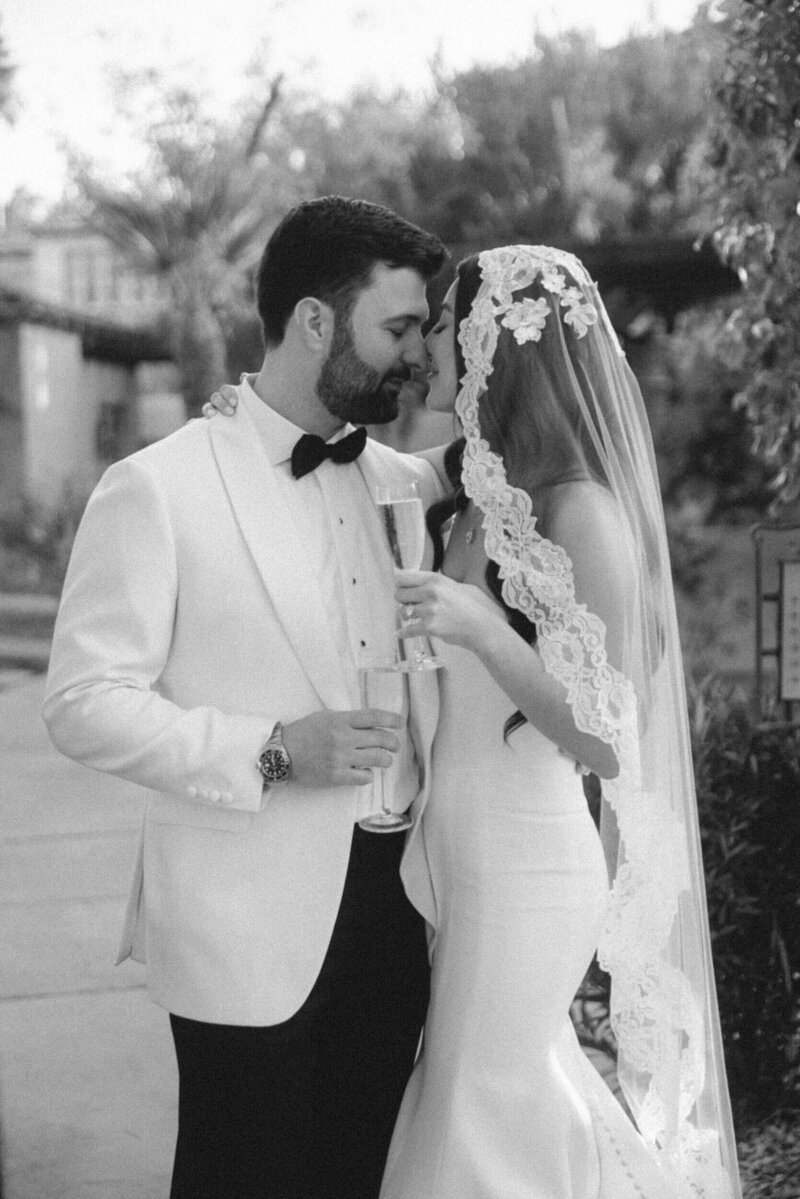 Arizona wedding planner adjusting bride’s veil pre-ceremony