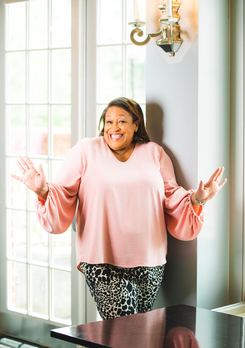 Angela, a wedding planner in Raleigh, NC, bringing warmth and expertise to seamless wedding coordination and management.