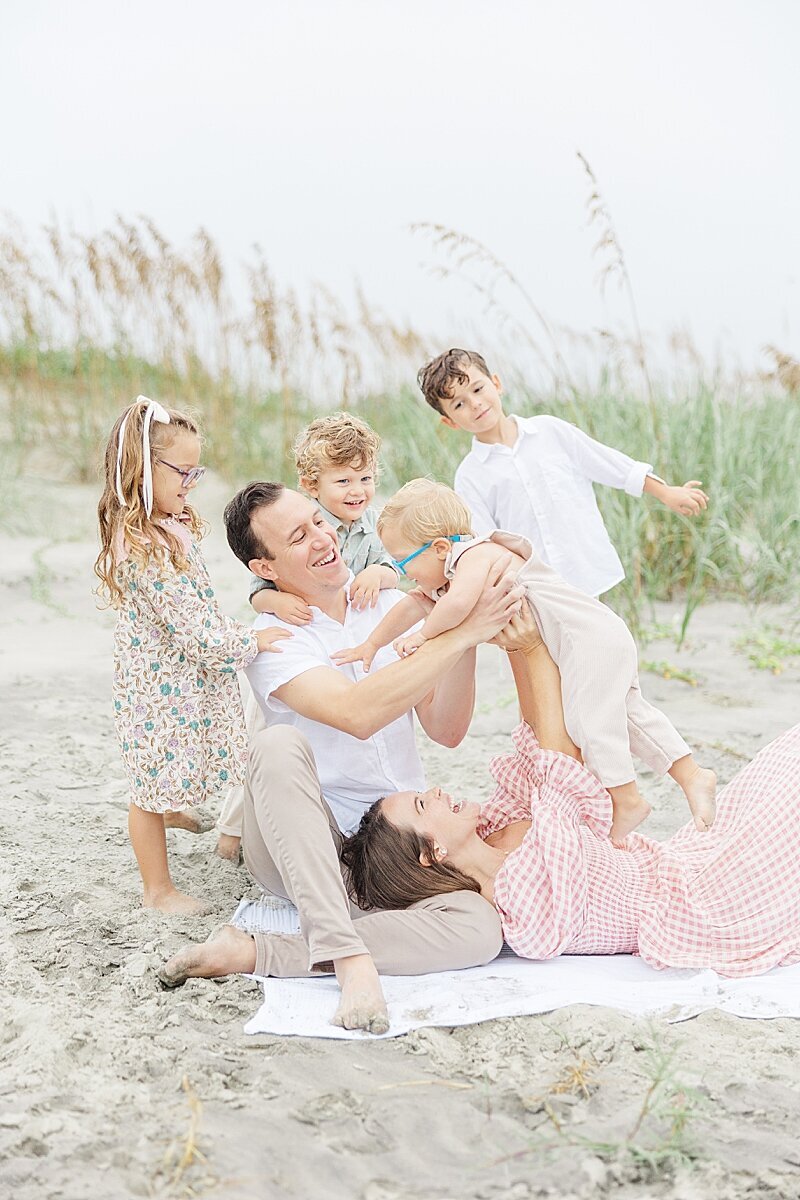 playful family photo from Kinston, NC photographer on the beach at Emerald Isle and Atlantic Beach
