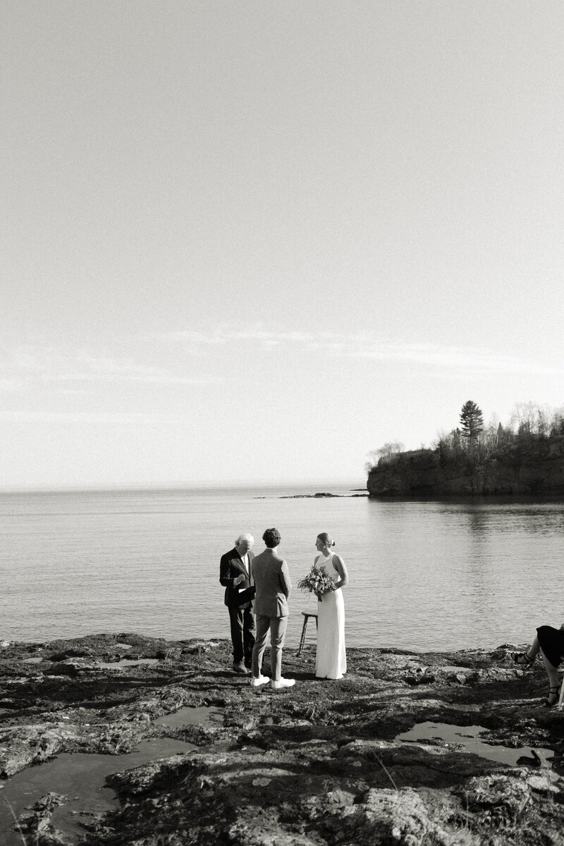 Intimate wedding ceremony along Minnesota's North Shore photographed by Emmie Verdell Photo.