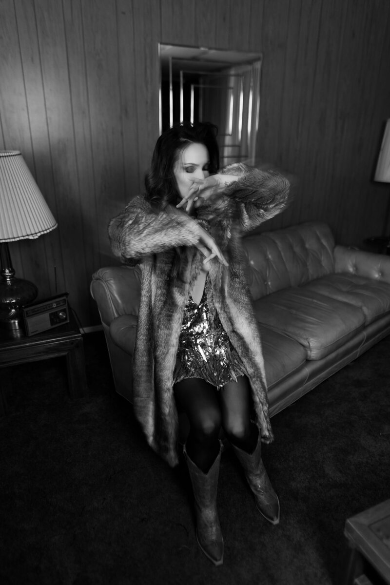 Black and white photo of Juliet Trnka, dancing-Direct Knowing brand photoshoot