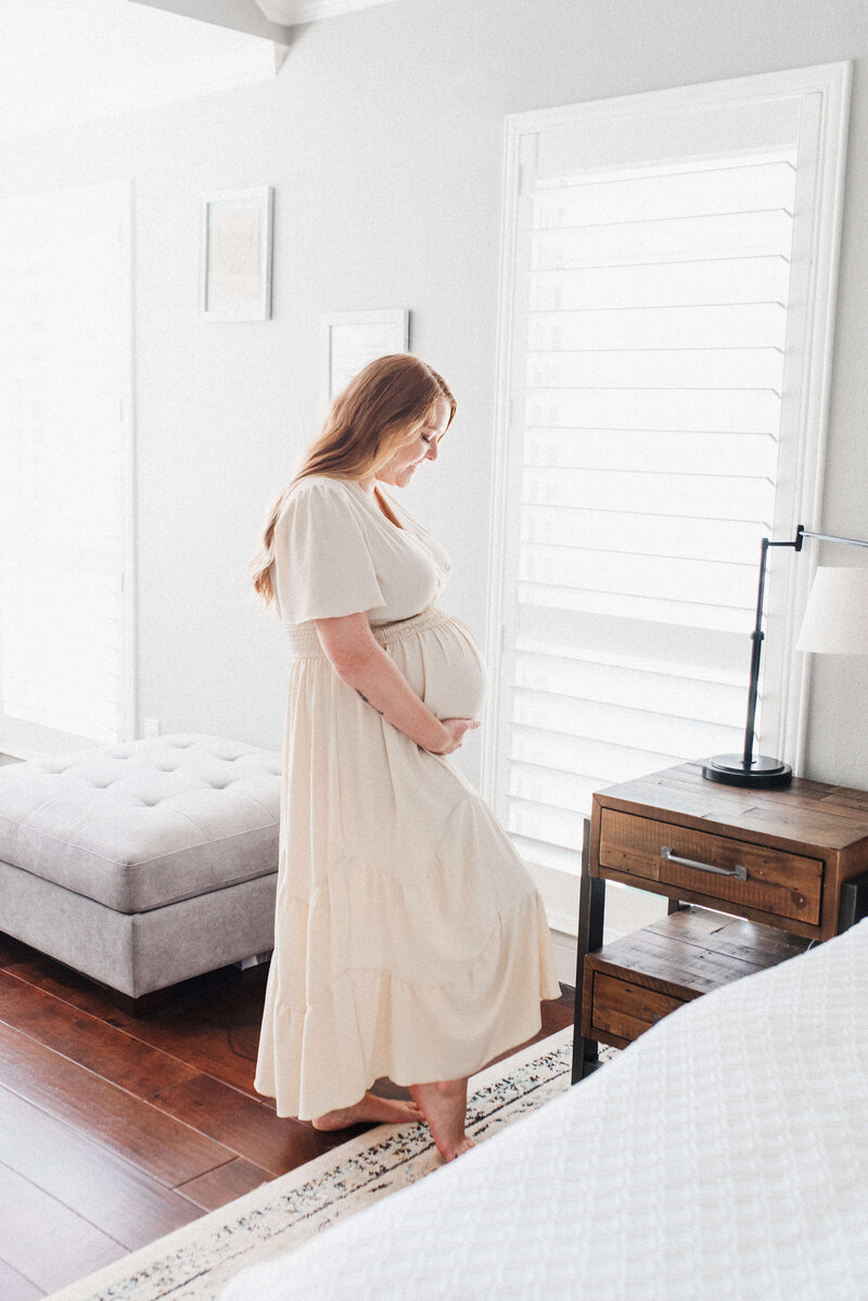 a black and white silhouette of a pregnant woman
